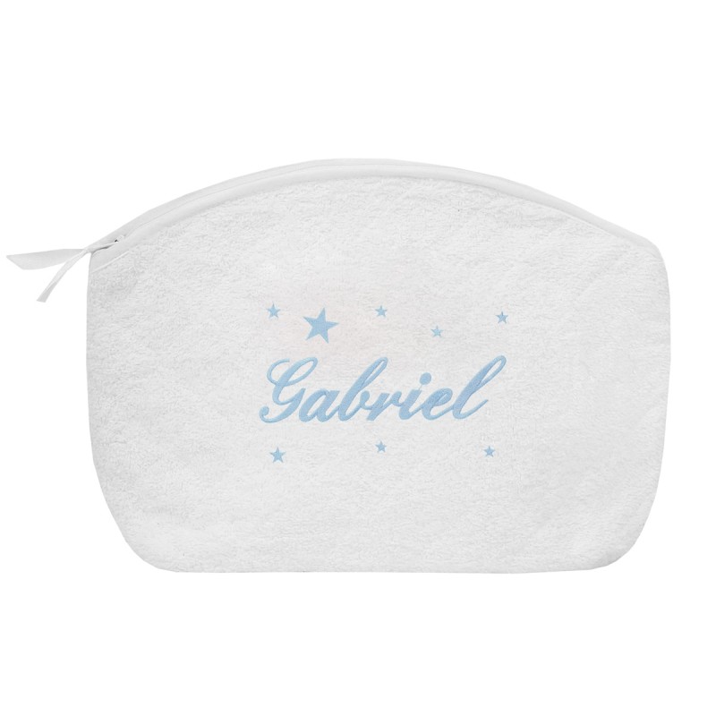 Trousse de toilette blanche personnalisée au prénom de l'enfant avec des étoiles.