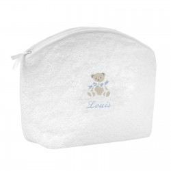 Trousse de toilette blanche brodée avec un ours.